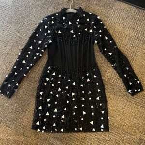 I got the dress from shopdenoa in a size medium. The dress color is all black